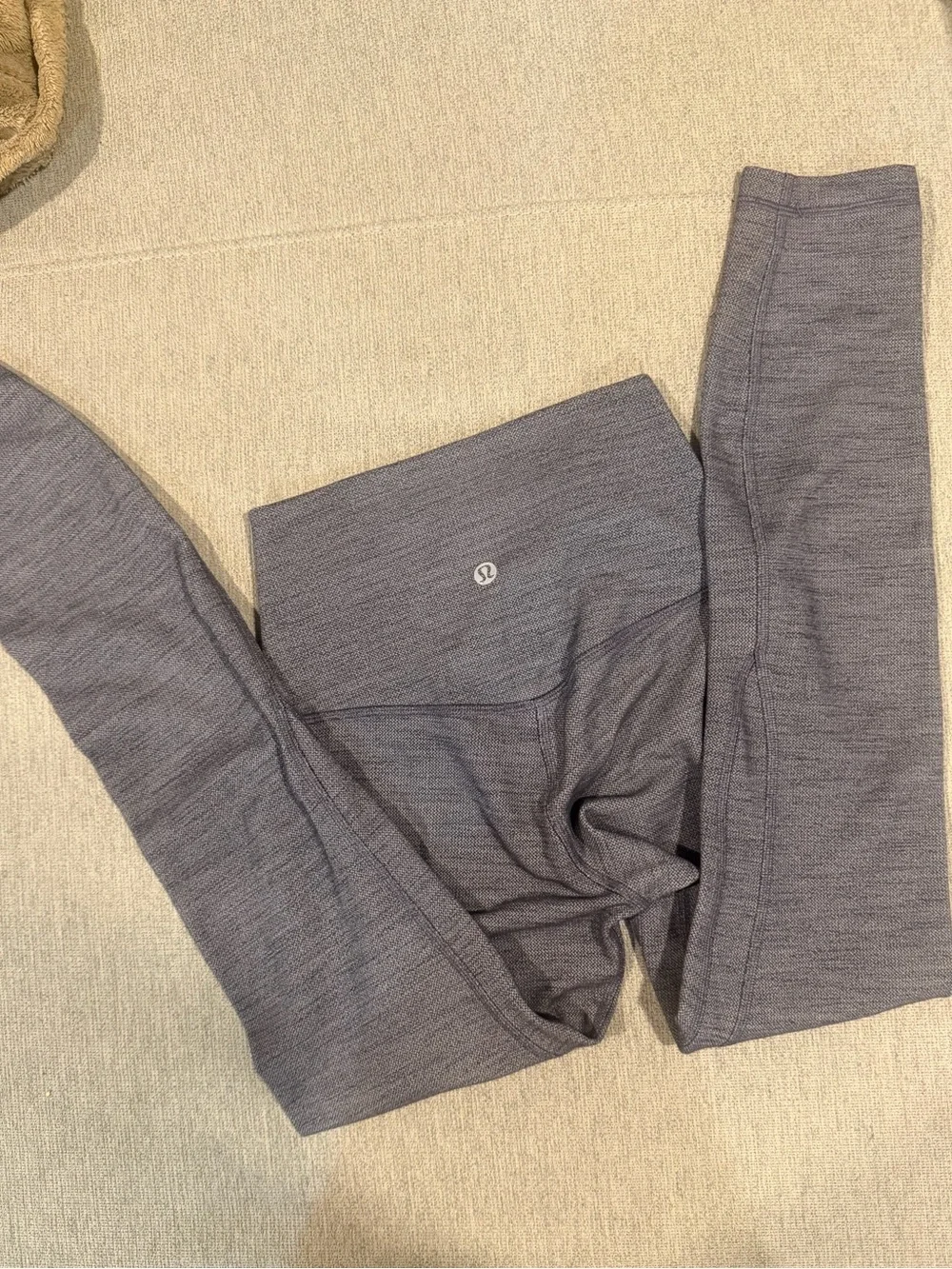 Lululemon High-Rise Gray Leggings And a Tank Top